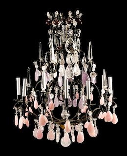 A Louis XV Style Patinated Bronze, Rock Crystal, Amethyst and Rose Quartz Eight-Light Chandelier Height 36 x diameter 28 inches.