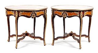 A Pair of Louis XV Style Gilt Bronze Mounted Parquetry Gueridons Height 31 x diameter of top 35 inches.