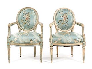 A Pair of Louis XVI Style Painted Fauteuils Height 35 inches.