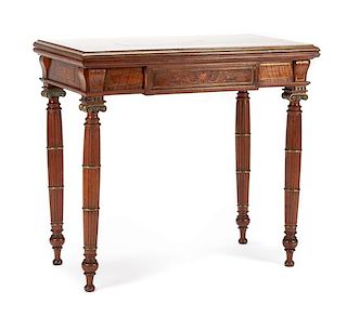 A French Bronze Mounted Mahogany and Marquetry Flip-Top Game Table Height 31 x width 33 3/4 x depth 18 inches.