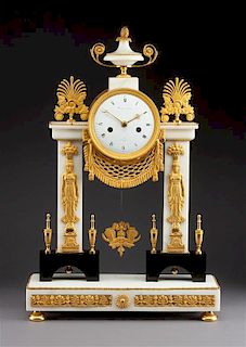 A French Neoclassical Gilt Bronze and Marble Mantel Clock Height 20 3/8 x width 13 3/8 inches.