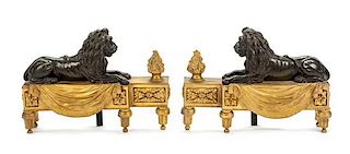 A Pair of French Gilt and Patinated Bronze Chenets Height 12 x width 17 inches.