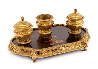 A French Gilt Bronze and Lacquered Inkwell Width 13 3/4 inches.