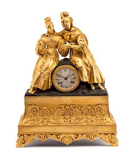 A Charles X Gilt Bronze Figural Clock Height 21 x width 15 inches.