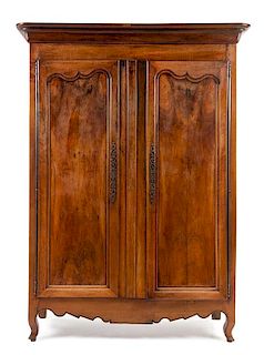 A Louis Philippe Burlwood Armoire Height 84 1/4 x width 62 x depth 23 1/2 inches.