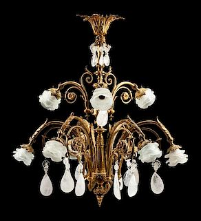 A French Neoclassical Style Gilt Bronze and Rock Crystal Nine-Light Chandelier Height 337 x diameter 30 inches.