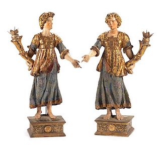 A Pair of Italian Painted and Parcel Gilt Figural Torchieres Height 48 inches.