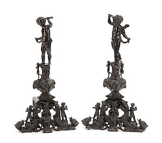 A Pair of Renaissance Revival Patinated Bronze Chenets Height 35 inches.