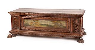 A Renaissance Revival Painted Walnut Cassone Height 24 x width 66 x depth 21 1/4 inches.