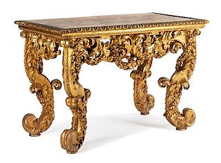 A Continental Giltwood Console Table Height 32 x width 49 1/2 x depth 25 1/2 inches.