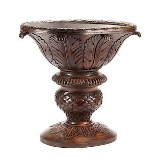 A Large Continental Carved Jardiniere Height 41 x width 43 inches.