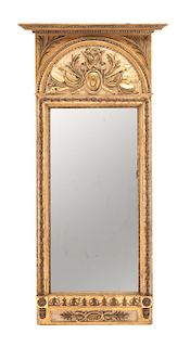 An Italian Neoclassical Painted and Parcel Gilt Mirror Height 73 3/4 x width 35 1/2 inches.