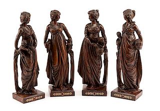 A Set of Four Italian Carved Wood Figural Groups Height 13 inches.