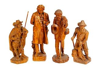 Four Continental Carved Wood Figures Height of tallest 26 inches.