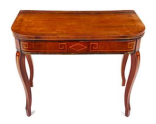 A Continental Mahogany Flip-Top Table Height 28 1/2 x width 36 x depth 17 1/2 inches.