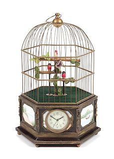 A Continental Automaton Porcelain Inset Birdcage with Clock Height 22 1/2 inches.