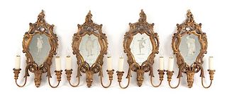 A Set of Four Venetian Giltwood Two-Light Girandole Mirrors Height 24 x width 15 1/2 inches.