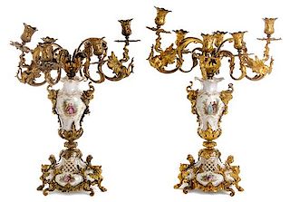 A Pair of Gilt Bronze and Berlin (K.P.M.) Porcelain Candelabra Height of taller example 25 inches.