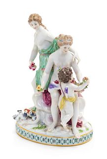 * A Meissen Porcelain Figural Group Height 8 1/4 inches.