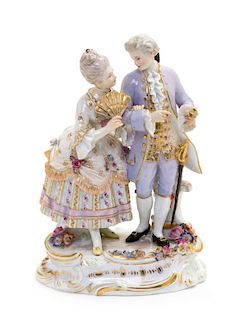 * A Meissen Porcelain Figural Group Height 7 1/2 inches.