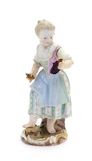 * A Meissen Porcelain Figure Height 5 1/2 inches.