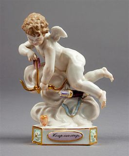 A Meissen Porcelain Figure Height 5 inches.