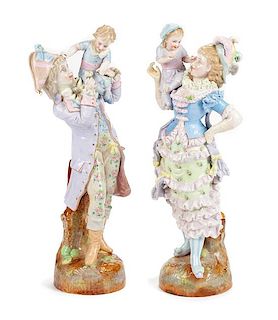 A Pair of German Porcelain Figures Height 23 inches.
