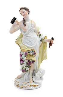 * A Meissen Porcelain Figure Height 6 1/2 inches.