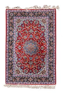 An Isfahan Wool Rug 3 feet 7 inches x 5 feet 5 inches.