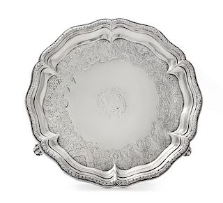 A George II Silver Salver, George Methuen, London, 1745, of circular form with a scalloped rim, the field chased with later flor