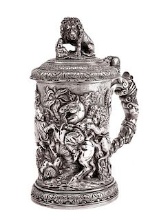 A Victorian Silver-Plate Tankard, Elkington & Co., Birmingham, 1889, the hinged lid with a lion finial above the body worked to