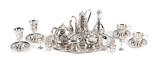 An Extensive Indian Silver-Plate Tea, Coffee and Dessert Service, Late 19th/Early 20th Century, comprising 2 coffee pots, 1 teap