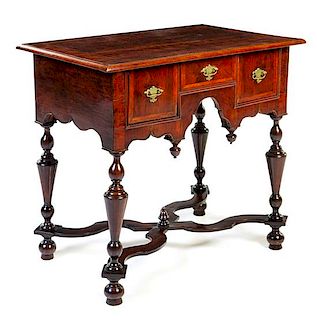 * A William and Mary Walnut, Maple and Birch Dressing Table Height 30 1/8 x width 32 1/4 x depth 20 3/4 inches.