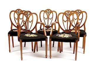 A Set of Eight George III Mahogany Dining Chairs Height 37 inches.