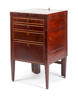 A George III Mahogany Lift-Top Dressing Table Height 35 x width 22 x depth 20 1/2 inches.