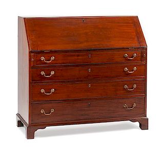 A George III Mahogany Slant-Front Desk Height 43 1/2 x width 47 1/2 x depth 22 inches.