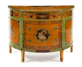 A George III Style Painted Satinwood Cabinet Height 36 1/2 x width 49 5/8 x depth 23 inches.