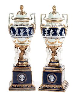A Pair of Minton Style Porcelain and Bisque Covered Urns