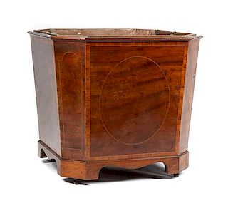 A Large English Mahogany Jardiniere Height 31 1/4 x width 34 x depth 34 inches.