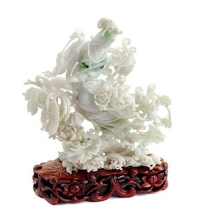 A Chinese Carved Jadeite Figure Height 7 inches.