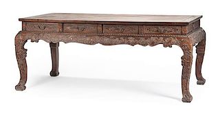 A Chinese Carved Center Table Height 34 x width 81 x depth 42 inches.