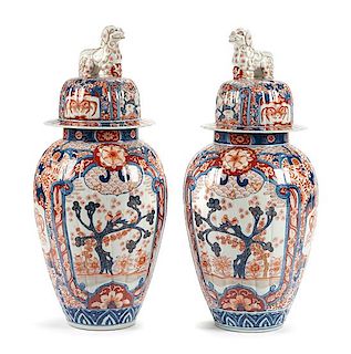 A Pair of Japanese Imari Porcelain Covered Vases Height 28 inches.