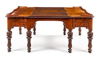 A Southeast Asian Colonial Teak Partners Desk Height 33 1/2 x width 75 1/2 x depth 44 1/2 inches.