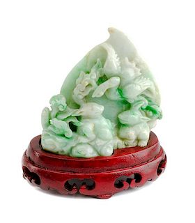 A Burmese Green Jade Figural Group Height 3 1/2 inches.