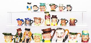 A Collection of Twenty-One Diminutive Porcelain Character and Toby Jugs by Various Makers, 20th Century,
