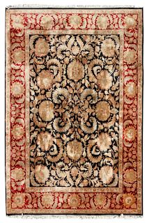 An Indo-Persian Wool Rug 12 feet 4 inches x 8 feet 8 inches.