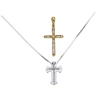 A 14K white gold necklace, and two diamond 14K white and yellow gold cross pendants.