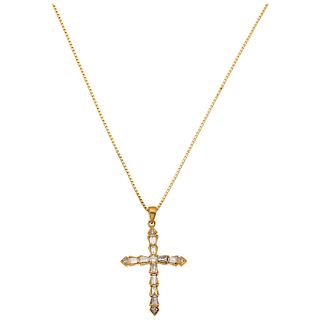 An 18K yellow gold necklace and diamond cross pendant.