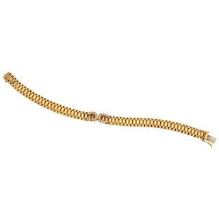 A diamond 18K yellow gold bracelet.