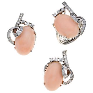A coral and diamond palladium silver ring and pair of earrings set.